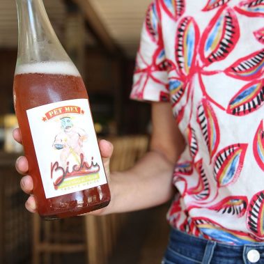 Mexican wine in waiter's hand